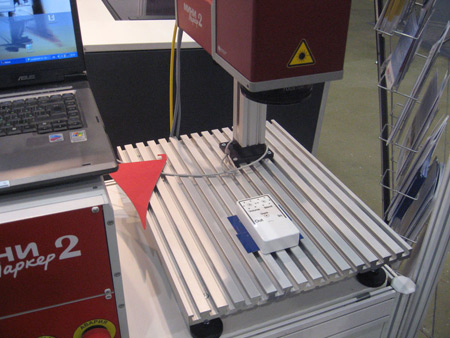 Laser marking a plastic face plate 